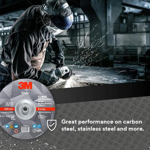 Worker using 9-inch Depressed Center Grinding Wheel T27 Quick Change for beveling weld removal on stainless steel in a workshop