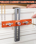 All In One Cabinet Handle Jig With Adjustable Knob And Precision Drill Guide for drawers shown in use on a cabinet door