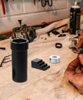 Kickass Motorcycle Mainshaft Nut Socket Wrench, black metal tool on workbench for quick twin and primary sprocket removal.