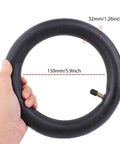 Hand holding 2 Pack 8.5 Inch By 2 Inch Scooter Inner Tubes For 50 75 6.1 Tire Size Fit Electric And Gas Scooters