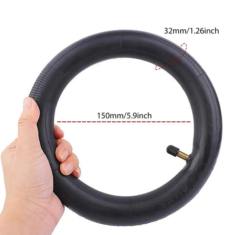 Hand holding 2 Pack 8.5 Inch By 2 Inch Scooter Inner Tubes For 50 75 6.1 Tire Size Fit Electric And Gas Scooters