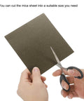 Cutting Waveguide Cover Mica Sheets DIY Fix Kit 6 By 6 Inch 0.008 Inch Thick High Temp 1050°C with scissors