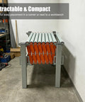Heavy Duty Adjustable Conveyor Roller Table With Universal Wheels For Moving Wood And Construction Materials Up To 110lbs Loading Capacity And Solid Iron Build, shown compact and retractable.
