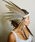 Person wearing headband with 12 Pcs Natural Ringneck Pheasant Tail Feathers 14 To 16 Inch For Crafts Weddings Parties Performances
