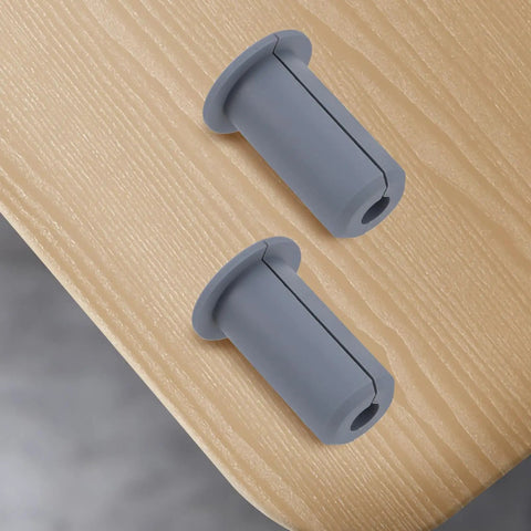 Get These 6pcs Silicone Cable Grommets That Are Totally Fire Proof And Wear Resistant For Perfect Wall Hole Cover In Your Home Or Office To Keep Wires Outta Sight., grey silicone cable grommets on wood desk