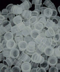 Large Tattoo Ink Cups 500 Pack Plastic Pigment Cups Size 15 Disposable Microblading Cups for tattoo ink tools viewed closely