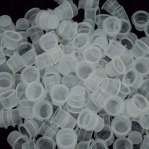 Large Tattoo Ink Cups 500 Pack Plastic Pigment Cups Size 15 Disposable Microblading Cups for tattoo ink tools viewed closely