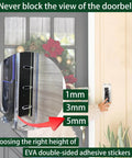 Anti Theft Video Doorbell Mount In Transparent Acrylic Lock Box installed on a door, showing height stickers for 1mm, 3mm, 5mm.
