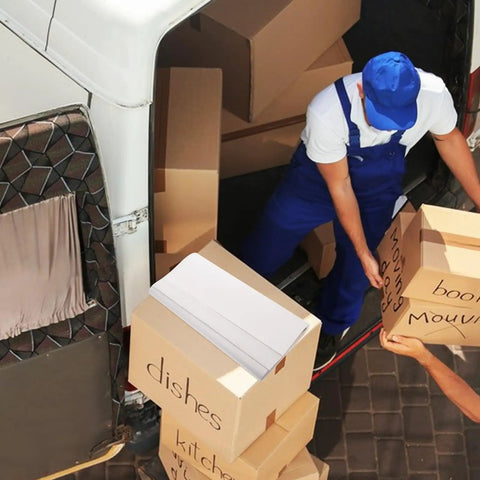 100 Sheets Moving Packing Paper Wrap For Fragile Items in a box, used for cushioning during home and office moves.