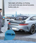Man using a pressure washer to clean a car with a Brass Heavy Duty Inlet Filter For Hose With Three Quarter Inch And One Half Inch Barbs