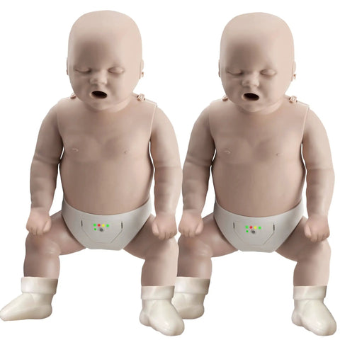 View of two infant manikins from the Take2 CPR Manikin And UltraTrainer Kit With Feedback For Realistic Practice Two Adults And Two Infants Plus Two AED UltraTrainers And Full Accessory Pack Including Shields Lung Bags Kneeling Mats ManiVests ManiBibs And Carry Bags set.