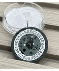 NH34 Compatible Automatic Mechanical Movement Kit With 24 Hour Hands And 3.0 Date displayed on wooden surface