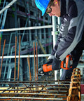 Pro Rig Cordless Angle Grinder With 125 Mm Disc And 18 Volt Brushless Motor Cranks Out 1100 Watts Of Torque used on rebar in construction site.