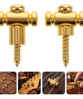 Premium Brass Electric Guitar String Trees Retainers 2 Pairs close-up view, featuring golden brass material and mounting for tuner heads.