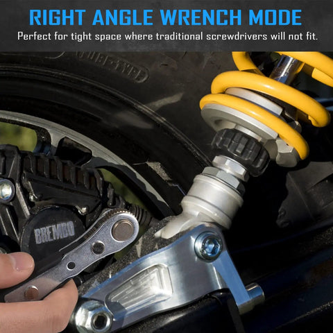 Hand using Compact Mini Ratchet Screwdriver Set With One Quarter Inch S2 Steel Bits in right angle mode on bike suspension.