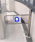 Premium Heavy Duty Self Closing Security Gate Featuring Slick One Way Swing Action For Bustling Warehouses And Supermarket Aisles With Zero Hassle Pedestrian Flow Control, stainless steel barrier at entrance.