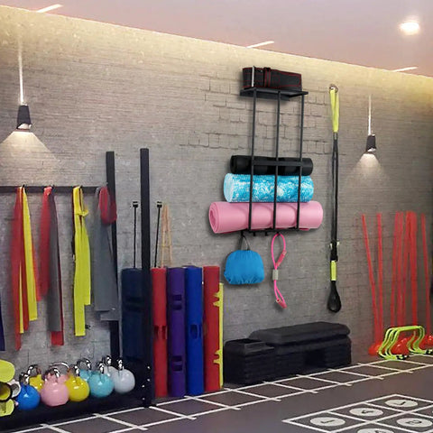 Heavy Duty Garage Wall Mount Storage Rack For Outdoor Gear And Camping Essentials in use, holding mats and bags