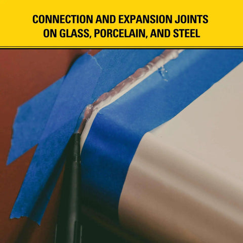 Application of All Purpose RTV Silicone Sealant on surfaces with blue tape, close-up on waterproof crack-resistant seal