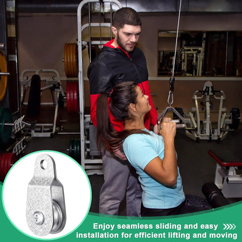20 Pack Single Pulley Block With Beefy Bearings Inside Cable Roller Snatch Block in gym setup with exercise equipment.