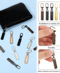 10 Piece Zipper Pull Replacement Set Silver Black Gold Copper For Jackets Bags Luggage Backpacks Coats Shoes Durable Zipper Pull Tabs displayed with a black purse