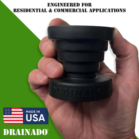 Person holding Universal Vacuum Hose To PVC Pipe Adapter For Easy AC Drain Line Unclogging No More Hack Jobs Fits PVC From Three Quarters Inch