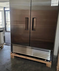 Straight Up Heavy Duty 2 Door Commercial Freezer Refrigerator Cooler Upright Reach In Stainless Steel ETL Certified 49 Cubic Fan Cooled Kitchen Appliance For Restaurant And Shop in a commercial setting.