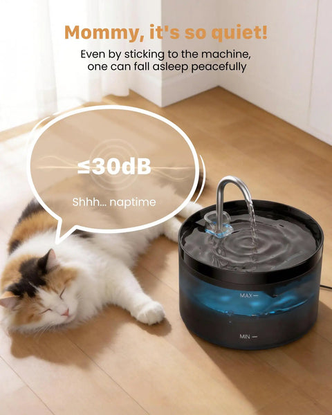 Cat sleeping beside 2L Pet Water Fountain For Cats And Dogs, Automatic Dispenser with Quiet Operation, black and transparent design