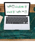 Ergonomic Large Mouse Pad And Keyboard Wrist Rest Dope Desk Pad For Keyboard And Mouse 4 In 1 Extended Gaming Desk Mat With Wrist Support For Home Office Study Green Leaves in use with laptop and mouse.