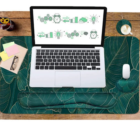 Ergonomic Large Mouse Pad And Keyboard Wrist Rest Dope Desk Pad For Keyboard And Mouse 4 In 1 Extended Gaming Desk Mat With Wrist Support For Home Office Study Green Leaves in use with laptop and mouse.