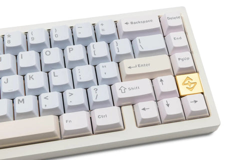 Close-up of 65 Percent Wireless Mechanical Keyboard Features Hotswap Switches, showing CNC aluminum keys and gold accent.