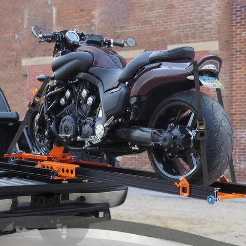 Heavy Duty Endless Ratchet Straps No Hook Setup One Inch By Eight Feet 1860 Pound Break Strength Black Cargo Tie Downs securing a motorcycle in a truck bed.