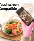 Person using phone wearing Nitrile Exam Gloves 4 Mil Large Cherry Blossom Food Safe Disposable Latex Free Powder Free Box of 100