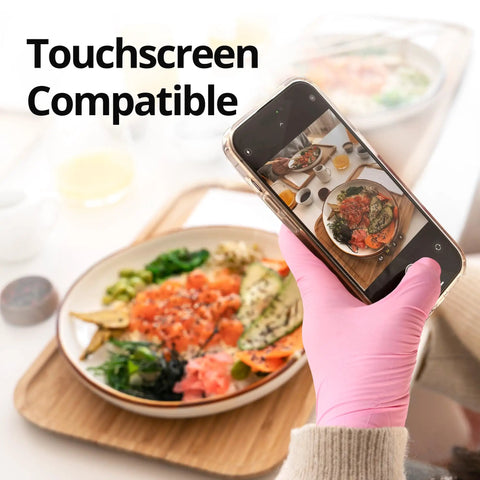 Person using phone wearing Nitrile Exam Gloves 4 Mil Large Cherry Blossom Food Safe Disposable Latex Free Powder Free Box of 100