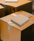 12 Pack Corrugated Paper Filler Sheets For Boxes And Shipping Easy Cut To Size Protective Cardboard Inserts stacked on box