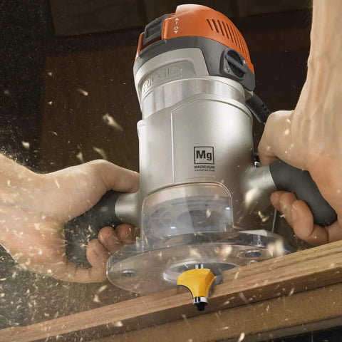 Pro Grade 1/2 Inch Shank Router Bit Set in use on wood, showing hands guiding tool with 70 Piece Carbide Kit for woodworking