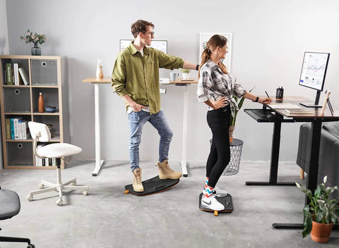People using Standing Desk Mat With Anti Fatigue Bar And Wooden Wobble Balance Board For Ergonomic Comfort And Active Office Or Home Use All Day Medium Size Obsidian Black