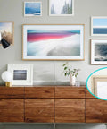 Room with art hung using Heavy Duty Coated Picture Hanging Wire #6 50 Feet Braided Wire Holds Up To 60lbs