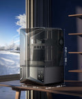 Saturn 4 Ultra 16K Resin 3D Printer With 10 Inch Mono LCD on desk, showing transparent lid, in modern room with window view