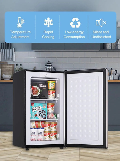 Sleek 3.2 Cu Ft Upright Mini Freezer With Adjustable Removable Shelves And Dope Silver Cabinet with ice cream and snacks organized.