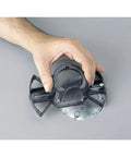 Hand holding ceiling fan mounting hardware for Dope 42 Inch Five Blade Ceiling Fan With Remote Control, Energy Efficient And Quiet Operation.