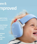 Smiling toddler wearing Extra Cozy Baby Ear Muffs For Smooth Airport Trips And Loud Concerts in blue, showcasing noise blocking features.