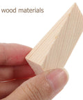 Hand holding a wedge from Heavy Duty Wooden Door Stop Wedges 5 Pack Triangular Door Holder Protects Walls At Home Office And Store Use Durable Reusable Stopper Keeps Doors From Slamming.