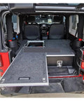 Heavy Duty Tough On The Trail Aluminum Camping Kitchen Drawer Chest And Tool Box For Pickup Truck Bed and Van Ute With Sealed Storage And Smooth Rollers inside an SUV, showing drawer extended.