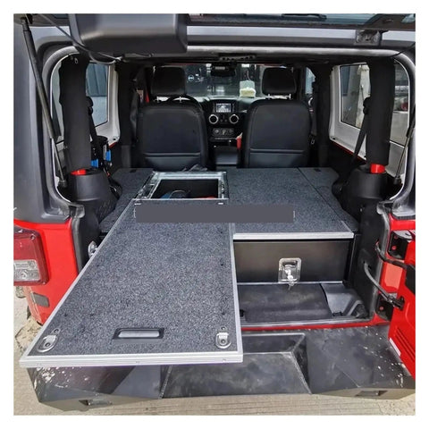Heavy Duty Tough On The Trail Aluminum Camping Kitchen Drawer Chest And Tool Box For Pickup Truck Bed and Van Ute With Sealed Storage And Smooth Rollers inside an SUV, showing drawer extended.