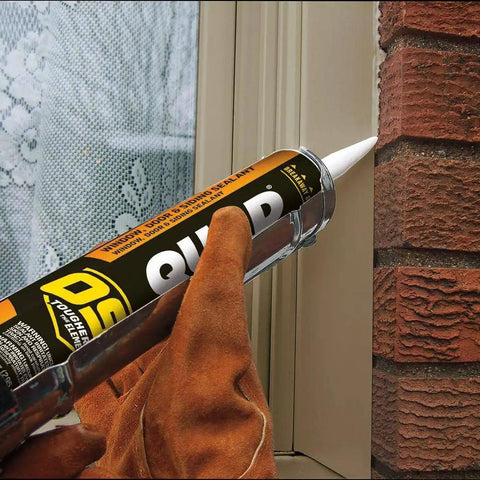 Applying beige window door and siding sealant 10 oz tubes advanced formula weatherproof exterior caulk to home gap
