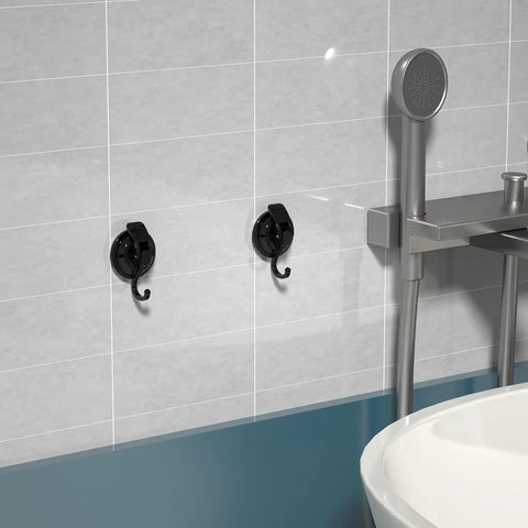 Heavy Duty Vacuum Suction Cup Hooks Black 2 Pack For Smooth Walls And Glass mounted on bathroom tiles holding towels.