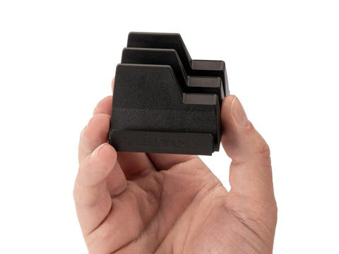 Hand holding a black 3-tab module from 20 Tool Modular Wrench Organizer Set With 3 Tab And 5 Tab Modules, Pro Grade Customizable Wrench Storage System, Patent Pending, Fits A Wide Range Of Tools, Made In USA, Black.
