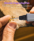 Mini Cordless Rotary Tool Kit with 5 Speed Settings and 30000 RPM 42 Accessory Set in use for engraving jewelry