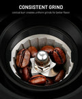 Heavy Duty Electric Conical Burr Coffee Grinder With 35 Dial In Settings And A Spacious Bean Hopper showing conical burr with coffee beans.