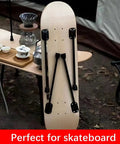 Sweet Set Of Four Portable Folding Table Legs Crafted From Skateboards And Longboards With Protective Floor Pads ideal for camping setups.